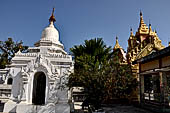 Myanmar - Mandalay, Kuthodaw Pagoda. 729 white pitaka pagodas contain the Tipitaka, the sacred texts of Theravada Buddhism. 